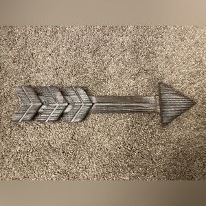 White brushed wooden arrows. Wall decor